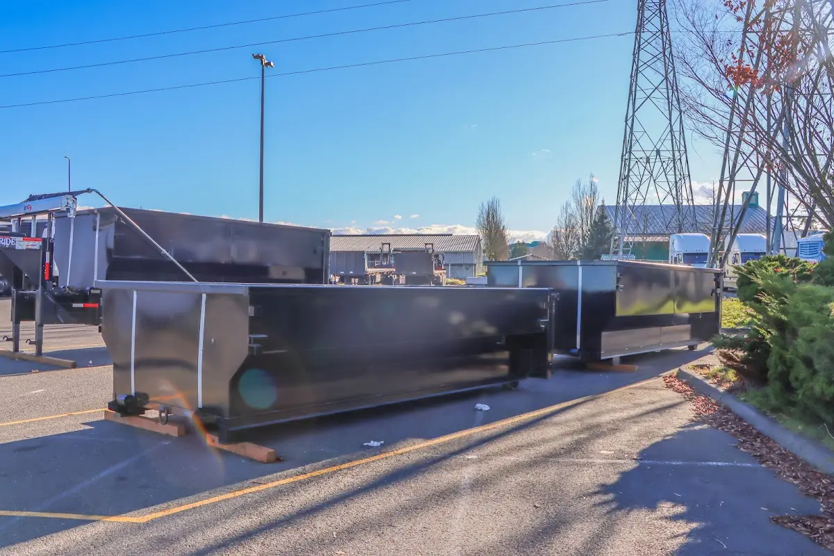 Roll-off dumpster ready for waste disposal at job site for Roll Off Dumpster Rental in Plainview